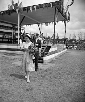 Calabar Collection: Queen Elizabeth II and The Duke of Edinburgh waving to the crowds as they leave