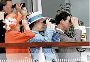 Queen Elizabeth II enjoying the races at Epsom Derby with the Queen Mother Queen Elizabeth II enjoying the races at Epsom Derby with the Queen Mother