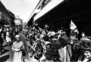 Queen Elizabeth II greets the crowd as she goes walkabout in Wrexham Queen Elizabeth II greets the crowd as she goes walkabout in Wrexham