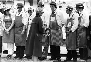 Queen Elizabeth II in Merseyside speaking with local workers Queen Elizabeth II in Merseyside speaking with local workers