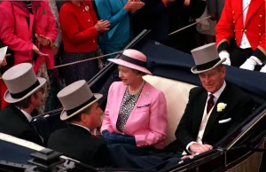 Queen Elizabeth II and Prince Philip riding in a Landau carriage at Royal Ascot Queen Elizabeth II and Prince Philip riding in a Landau carriage at Royal Ascot