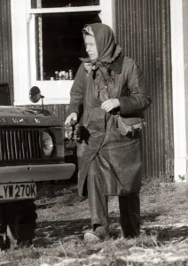 Queen Elizabeth II at Sandringham in Norfolk Outdoor clothing holding cloth Queen Elizabeth II at Sandringham in Norfolk Outdoor clothing holding cloth