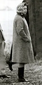 Queen Elizabeth II standing on one leg looking silly wearing wellies June 1980 Queen Elizabeth II standing on one leg looking silly wearing wellies June 1980