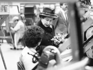 Queen Elizabeth II visits Plessey in Liverpool, and is seen here asking one of the System Queen Elizabeth II visits Plessey in Liverpool, and is seen here asking one of the System