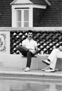 Queen lead singer Freddie Mercury seen here beside the swimming pool at their Queen lead singer Freddie Mercury seen here beside the swimming pool at their