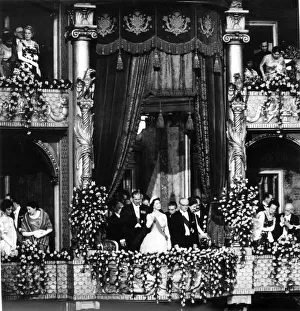 THE QUEEN AND PRINCE PHILIP WAVING FROM ROYAL BOX WHILE ATTENDING THE THEATRE DURING A THE QUEEN AND PRINCE PHILIP WAVING FROM ROYAL BOX WHILE ATTENDING THE THEATRE DURING A