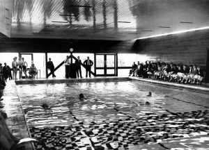 A race in progress in the new pool during the swimming gala that followed the opening of A race in progress in the new pool during the swimming gala that followed the opening of
