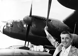 Former RAF flight engineer Alan Morgan in Lancasters, poses beside one of the famous Avro Former RAF flight engineer Alan Morgan in Lancasters, poses beside one of the famous Avro