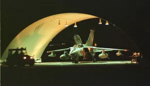 An RAF Tornado GR1 jet being prepared for battle in the hangar at Ali Al Salem Air Base An RAF Tornado GR1 jet being prepared for battle in the hangar at Ali Al Salem Air Base