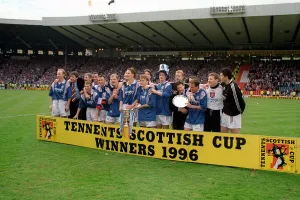 Rangers football team line up with their trophy after beating Hearts in the Tennents Rangers football team line up with their trophy after beating Hearts in the Tennents