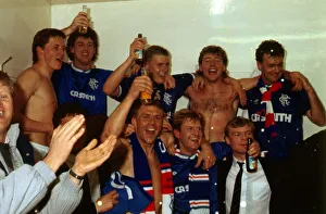 Rangers players celebrate in dressing room May 1987 Rangers players celebrate in dressing room May 1987