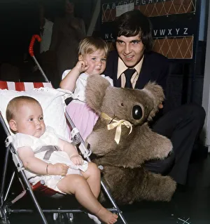 Rangers and Scotland footballer Tom Forsyth at the airport with his two daughters Rangers and Scotland footballer Tom Forsyth at the airport with his two daughters