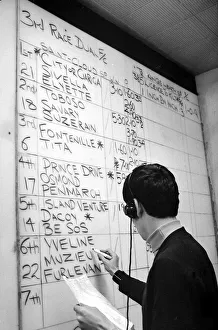 The results of the racing at Saint Cloud in Paris are marked on the board at Ladbrokes The results of the racing at Saint Cloud in Paris are marked on the board at Ladbrokes