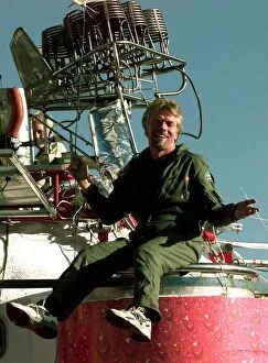 Images Dated 10th December 1997: Richard Branson on top of his Balloon capsule December 1997 with a small weather test