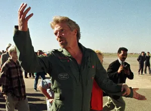 Richard Branson British tycoon gestures as he arrives at a Moroccan airbase after Richard Branson British tycoon gestures as he arrives at a Moroccan airbase after