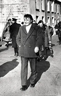 Richard Burton strolling through Lower Fishguard, a coastal town in Pembrokeshire, Wales Richard Burton strolling through Lower Fishguard, a coastal town in Pembrokeshire, Wales