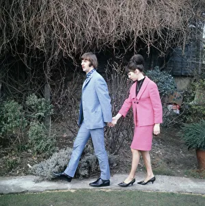 Ringo Starr walks along holding the hand of his Bride Maureen Cox 11 February 1965 Ringo Starr walks along holding the hand of his Bride Maureen Cox 11 February 1965