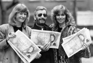 Ringo Starr waved aloft a jumbo-sized fiver yesterday (24.3 Ringo Starr waved aloft a jumbo-sized fiver yesterday (24.3