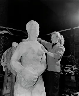 Mirror/0000to0099 00002/rita ling sculptress carves snowman 31 3 1952 Mirror/0000to0099 00002/rita ling sculptress carves snowman 31 3 1952