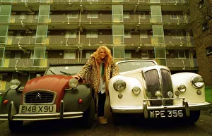 Road Record December 1998 Bernier female between red Citroen 2CV Road Record December 1998 Bernier female between red Citroen 2CV