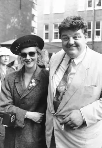 Robbie Coltrane actor arriving with unknown lady for the wedding of Nigel Planer Robbie Coltrane actor arriving with unknown lady for the wedding of Nigel Planer