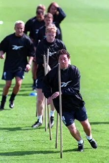 Robbie Fowler leads his teammates during a Liverpool training session Robbie Fowler leads his teammates during a Liverpool training session