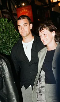 Robbie Williams & sister Sally Symonds pictured together at Heaven nightclub in London Robbie Williams & sister Sally Symonds pictured together at Heaven nightclub in London