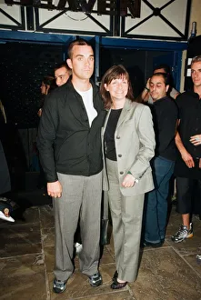 Robbie Williams & sister Sally Symonds pictured together at Heaven nightclub in London Robbie Williams & sister Sally Symonds pictured together at Heaven nightclub in London
