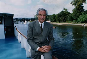 Robert Kilroy Silk former MP - TV Presenter on boat beside river grey suit Robert Kilroy Silk former MP - TV Presenter on boat beside river grey suit