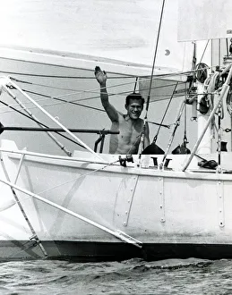 Robin Knox Johnston waves to his parents from his Suhaili boat at Falmouth before his Robin Knox Johnston waves to his parents from his Suhaili boat at Falmouth before his
