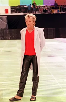 Rod Stewart Hampden photocall July 1999 wearing black leather trousers red v necked Rod Stewart Hampden photocall July 1999 wearing black leather trousers red v necked