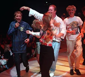 Rod Stewart pop star wearing a Scotland football strip singing on stage during his Rod Stewart pop star wearing a Scotland football strip singing on stage during his