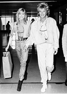 Rod Stewart Rock Singer Songwriter at Heathrow with his girlfriend Kelly Emberg Rod Stewart Rock Singer Songwriter at Heathrow with his girlfriend Kelly Emberg