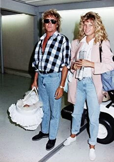 Images Dated 10th August 1992: Rod Stewart and Wife Rachel leaves Heathrow Airport Aug 1992