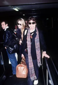 Rolling Stones singer Mick Jagger at London Heathrow Airport with Jerry Hall before Rolling Stones singer Mick Jagger at London Heathrow Airport with Jerry Hall before
