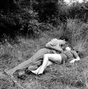 Romance. A young couple in love kissing. August 1953 D5205-001 Romance. A young couple in love kissing. August 1953 D5205-001