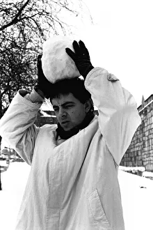 Rowan Atkinson during a flying a visit to Newcastle - having fun in the snow 14/01/87 Rowan Atkinson during a flying a visit to Newcastle - having fun in the snow 14/01/87