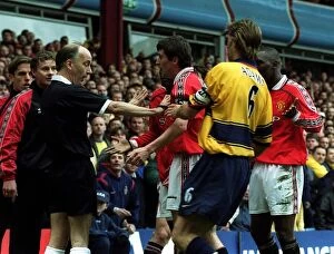 Images Dated 11th April 1999: ROY KEANE IS RESTRAINED BY TONY ADAMS AFTER DISALLOWED GOAL FOR OFFSIDE IN THE FA CUP