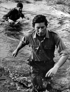 Running tall. Prince Charles wades along a stream. January 1975 P009343 Running tall. Prince Charles wades along a stream. January 1975 P009343