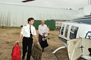 Images Dated 6th August 1994: Rupert Murdoch getting in to a helicopter. 6th August 1994