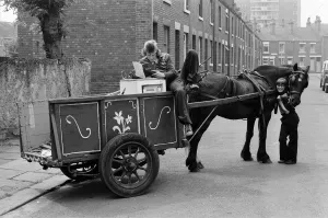 Russell Woods, Rag and bone boy in a residential street. 18th July 1975 Russell Woods, Rag and bone boy in a residential street. 18th July 1975