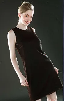 Ruth Kemmer model wearing a dark brown dress hair tied up 1996 Ruth Kemmer model wearing a dark brown dress hair tied up 1996