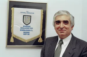 Sam Hammam, chairman of Wimbledon Football Club. He stands proudly in front of Sam Hammam, chairman of Wimbledon Football Club. He stands proudly in front of