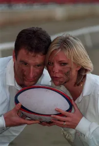 Samantha Janus Actress January 1998 With England rugby captain Mike Catt holding Samantha Janus Actress January 1998 With England rugby captain Mike Catt holding