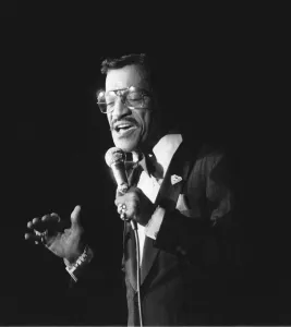 Sammy Davis Jnr junior singing in concert. 1982 Sammy Davis Jnr junior singing in concert. 1982