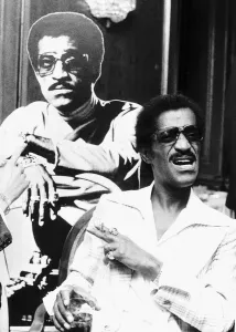 Sammy Davis Jnr singer actor with cardboard cut out 1974 Sammy Davis Jnr singer actor with cardboard cut out 1974