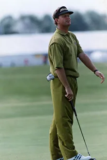 Sandy Lyle golfer holding putter golf club Sandy Lyle golfer holding putter golf club
