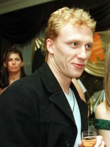 Scots actor Kevin McKidd January 1999 in a black coat, holding a glass of wine Scots actor Kevin McKidd January 1999 in a black coat, holding a glass of wine