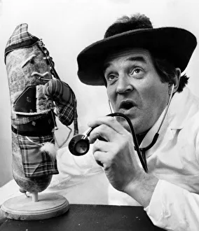 Scots comedian doctor Jimmy Logan giving his Haggis a bit of a medical check-up Scots comedian doctor Jimmy Logan giving his Haggis a bit of a medical check-up