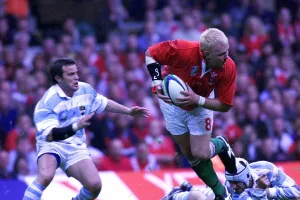 Scott Quinnell leads an attack in the Wales v Argentina match Scott Quinnell leads an attack in the Wales v Argentina match